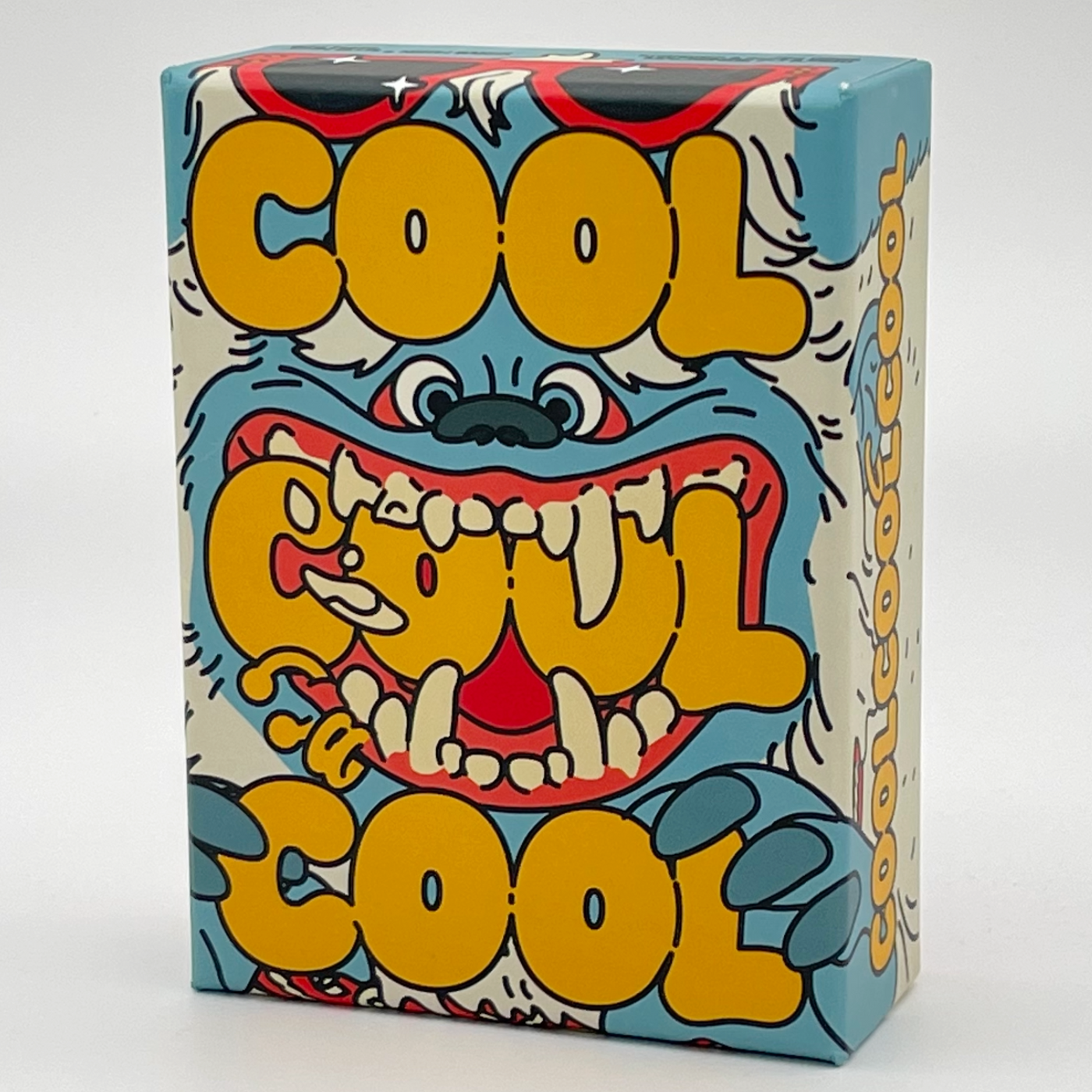Cool Cool Cool game box with yeti biting the title words